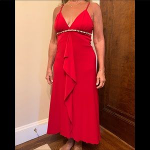 Classic floor length racerback gown with crystal embellishments